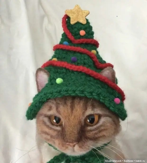Художница своими руками делает шапочки для котеек (фото 3)