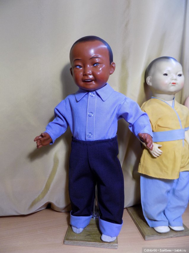 Реставрация двух тёмнокожих мальчиков. Один целлулоидный, второй металлический