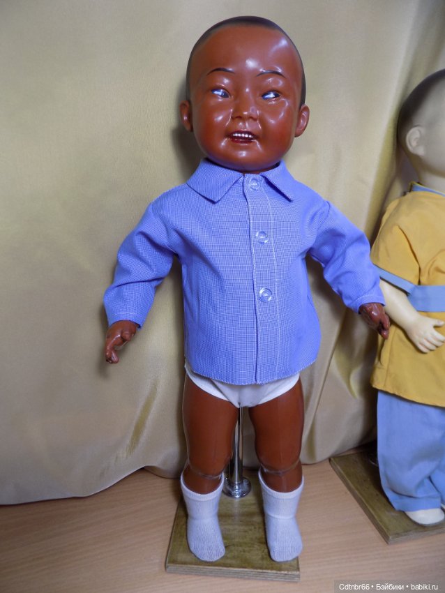 Реставрация двух тёмнокожих мальчиков. Один целлулоидный, второй металлический