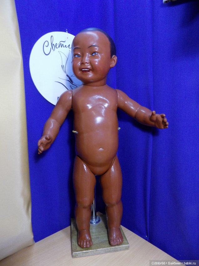 Реставрация двух тёмнокожих мальчиков. Один целлулоидный, второй металлический