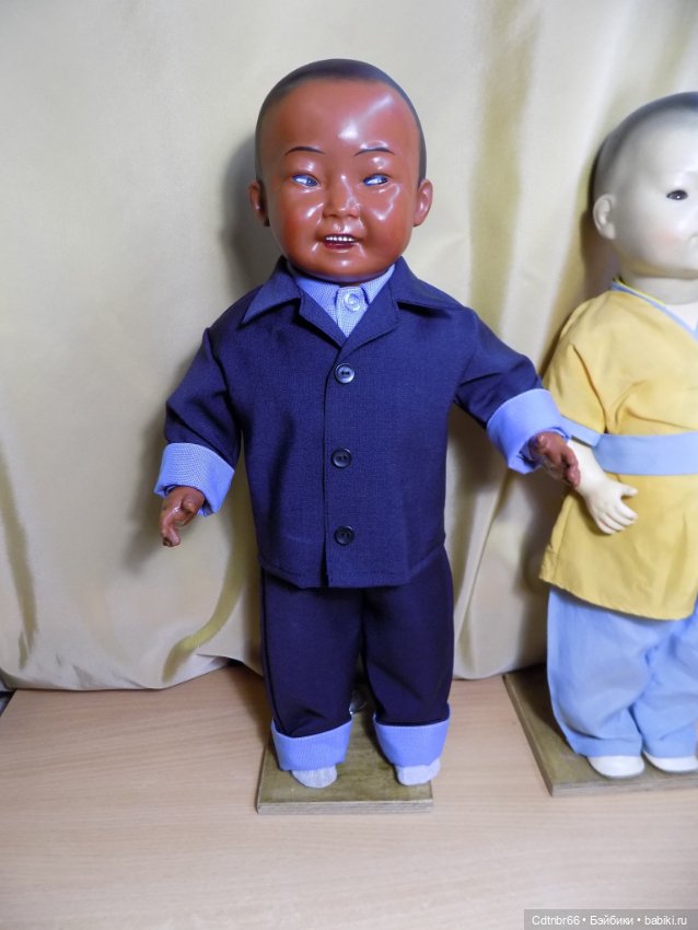 Реставрация двух тёмнокожих мальчиков. Один целлулоидный, второй металлический