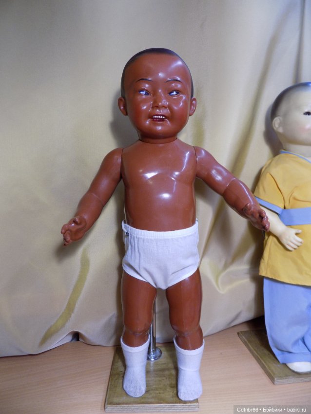 Реставрация двух тёмнокожих мальчиков. Один целлулоидный, второй металлический