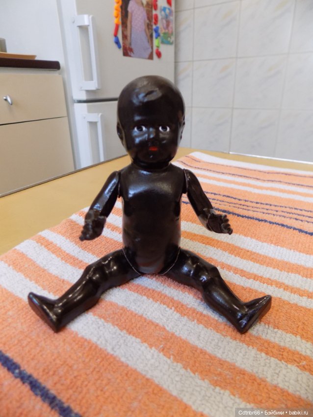 Реставрация двух тёмнокожих мальчиков. Один целлулоидный, второй металлический