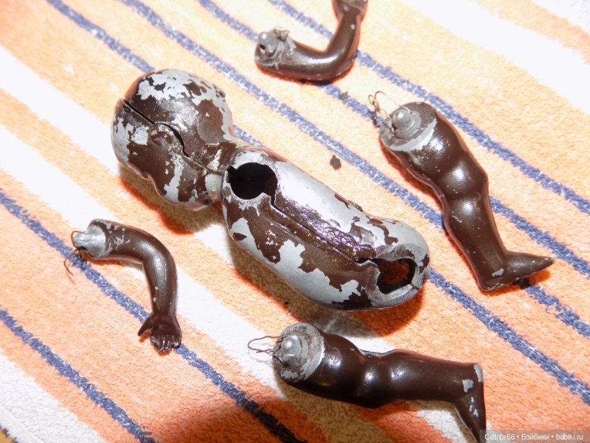 Реставрация двух тёмнокожих мальчиков. Один целлулоидный, второй металлический