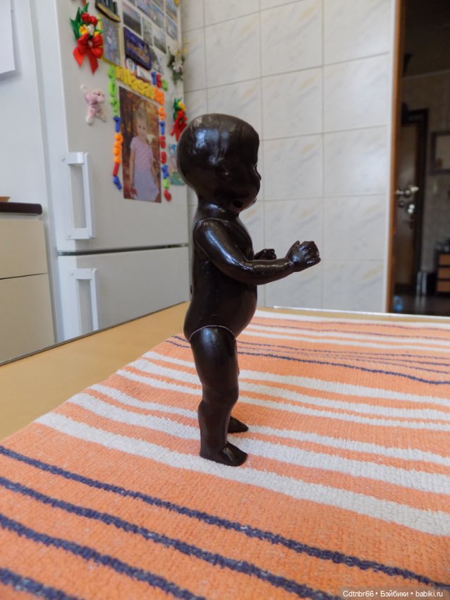 Реставрация двух тёмнокожих мальчиков. Один целлулоидный, второй металлический