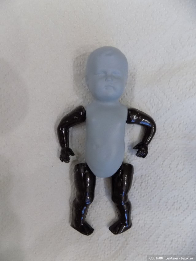 Реставрация двух тёмнокожих мальчиков. Один целлулоидный, второй металлический