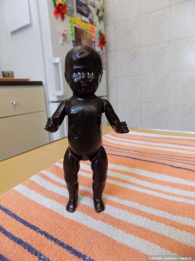 Реставрация двух тёмнокожих мальчиков. Один целлулоидный, второй металлический