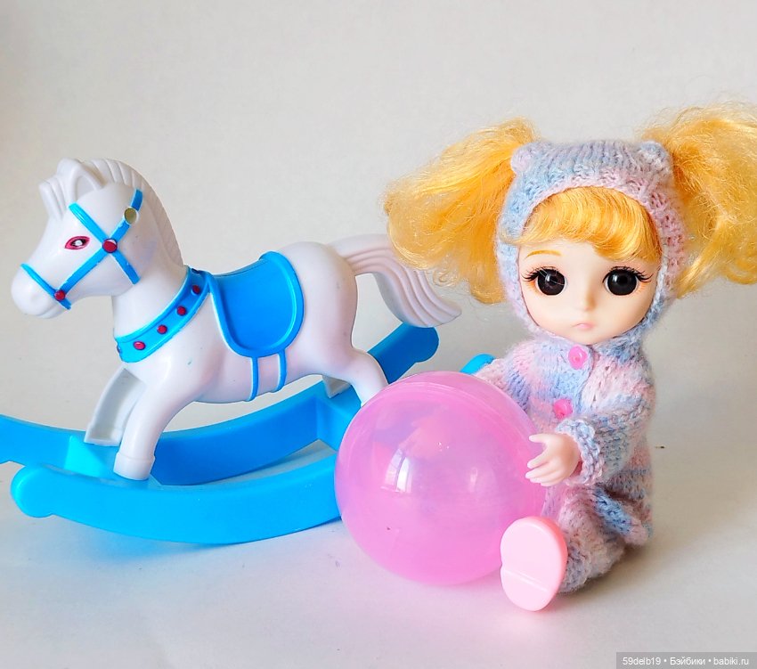 Малышка Тея в новом комбезике (фото 5)