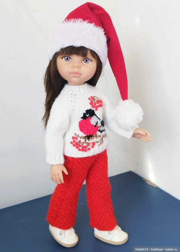 Словно отблески зари - на рябине снегири