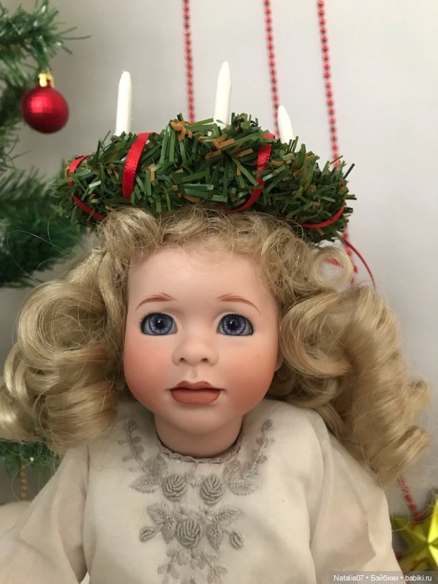 Праздник в Швеции, когда девушки надевают венок со свечами