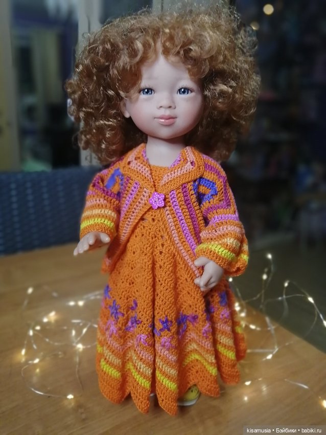 Кудрявая красавица в вязаных нарядах (фото 8)