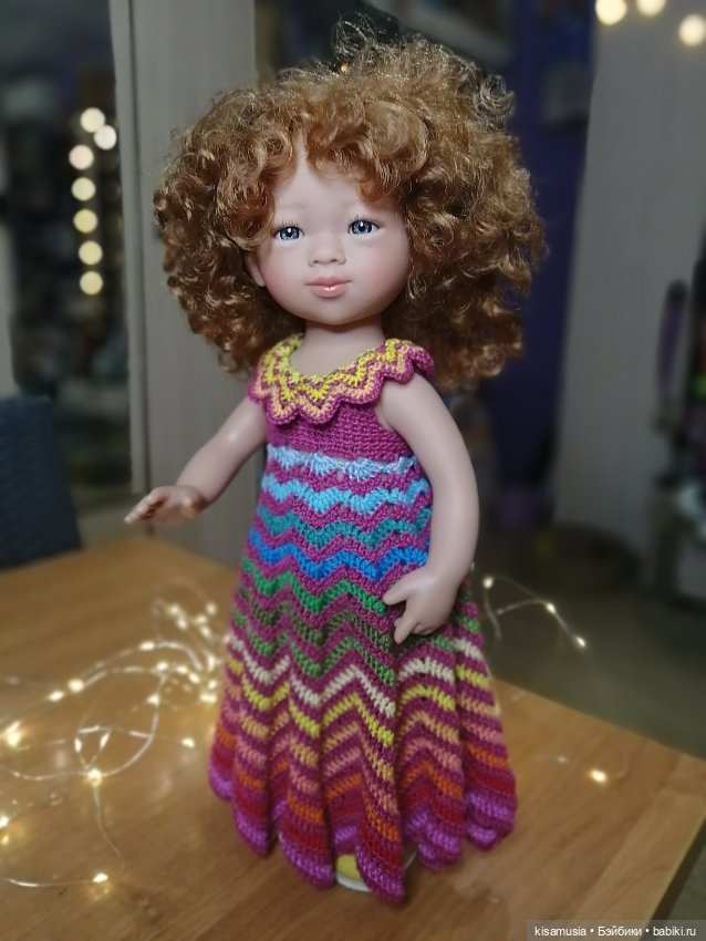 Кудрявая красавица в вязаных нарядах (фото 5)