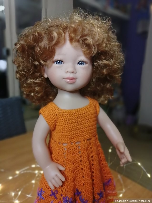 Кудрявая красавица в вязаных нарядах (фото 7)
