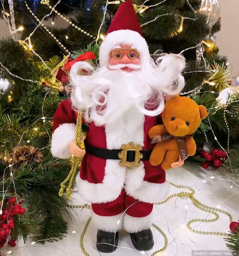 Деды Морозы на витринах магазинов (фото 9)