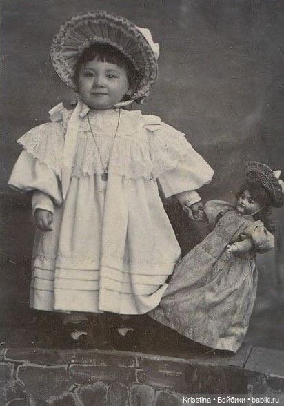 Антикварные и куклы и детки