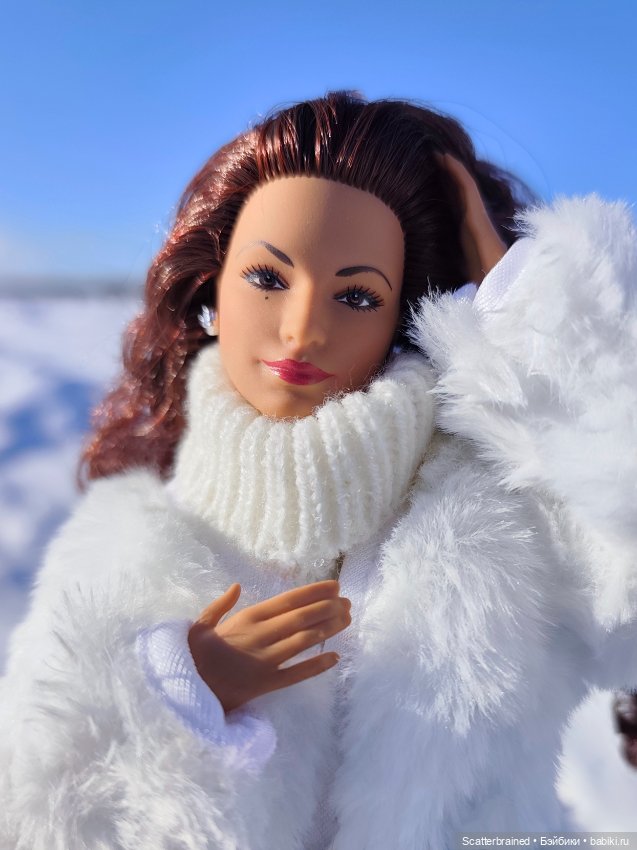 Глория Эстефан, зима и солнце (фото 10)