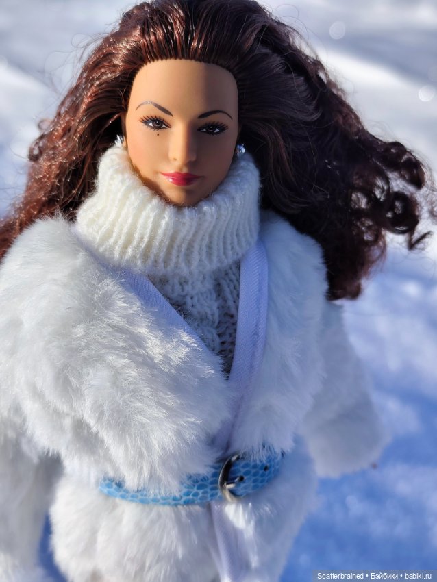 Глория Эстефан, зима и солнце (фото 5)