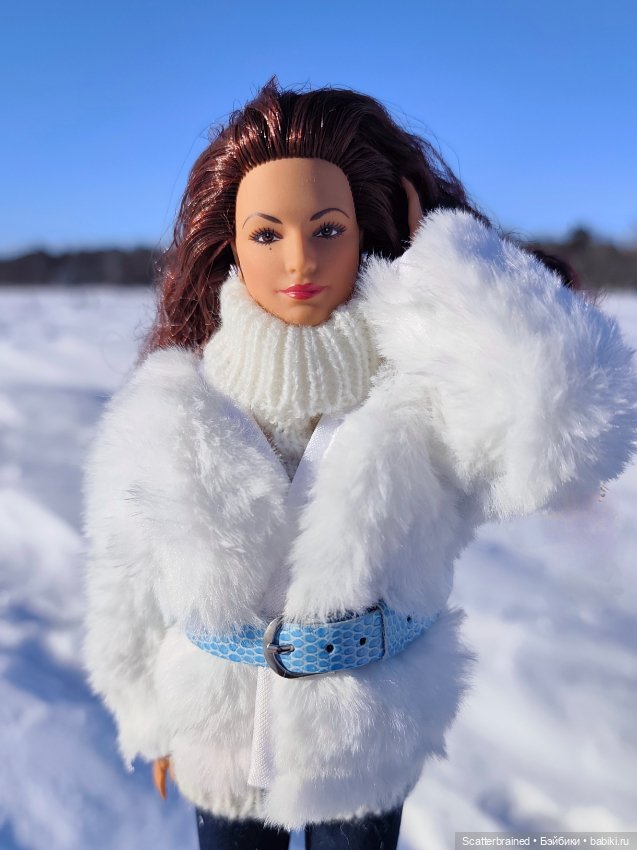 Глория Эстефан, зима и солнце (фото 9)