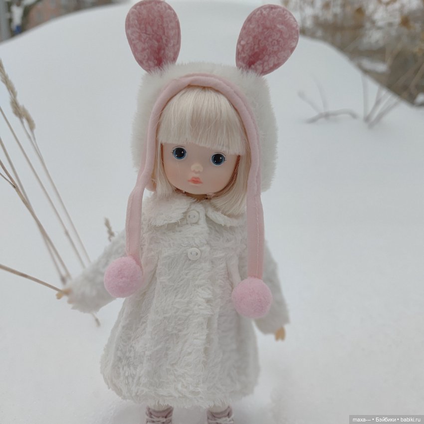 Прогулка Сури в новой шубке (фото 6)