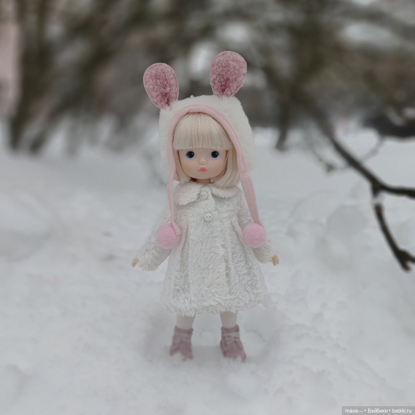 Прогулка Сури в новой шубке (фото 7)