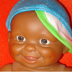 Мальчишка-улыбашка Нтанда-Эйо-Гугу-Секами - игровой пупс от Paola Reina