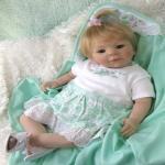 Коллекционные фарфоровые куклы-дети