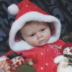 Мая в образе крошечного Санта Клауса. Кукла реборн