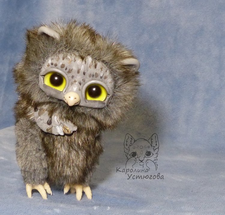 Парочка серых счастливых сов