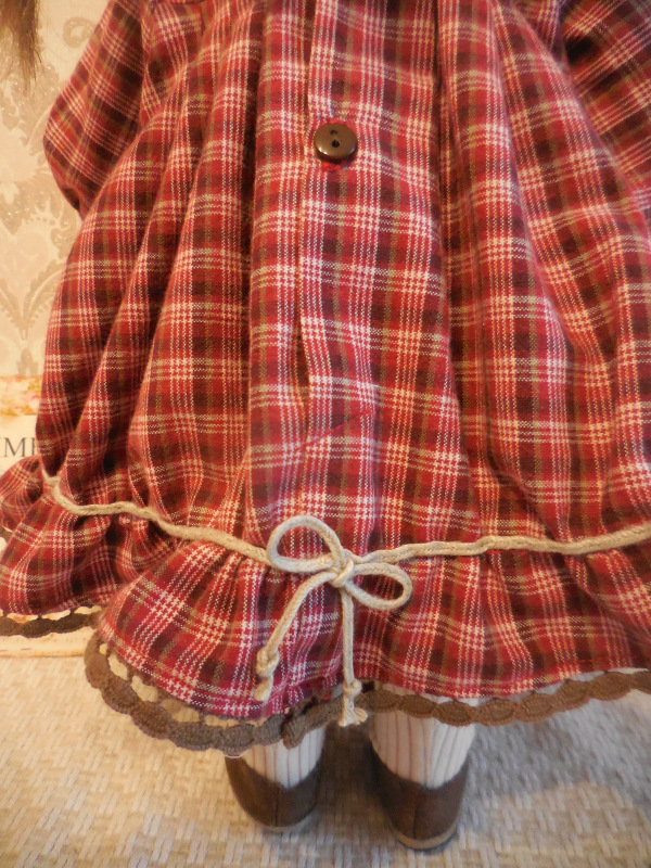 Юная фройляйн и непослушные косички