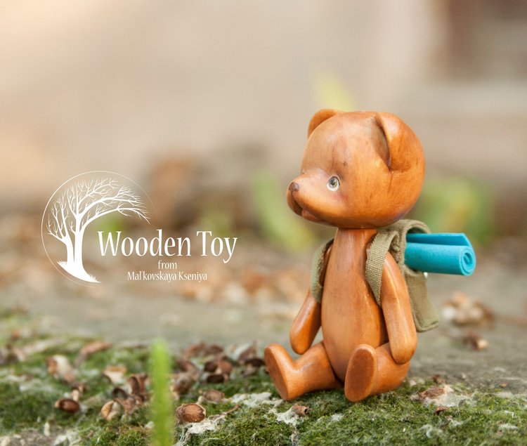 Деревянный мишка путешественник