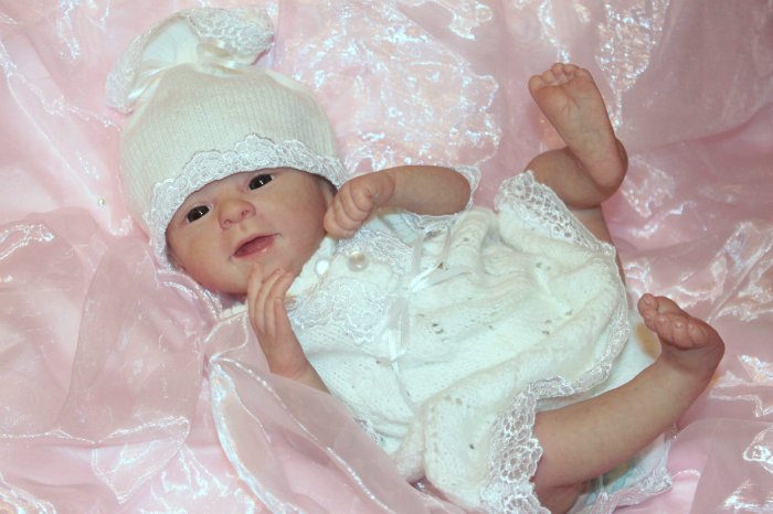 Вязаный комплект для маленькой куколки-принцессы