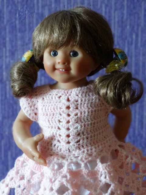 Розовые цветы или вязаные платья для любимых кукол