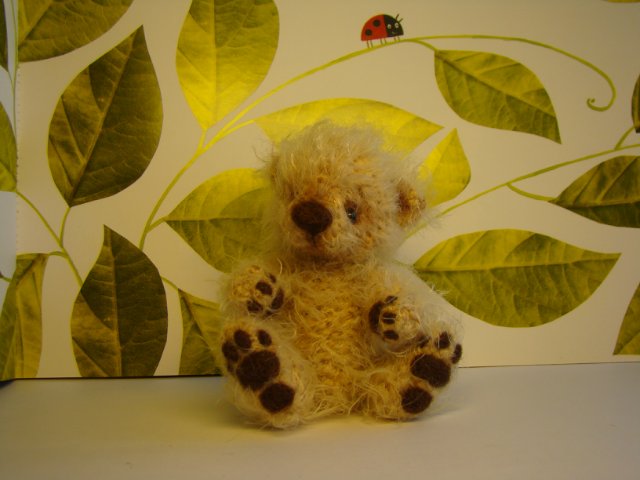 Мишка, игрушка вязанная спицами Ольги Чернухо