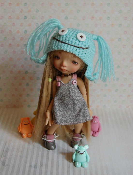 Малыши в смешных шапочках (фото 10)