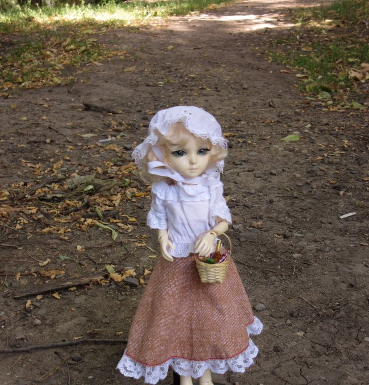 По дороге летним днём Магдалена шла с чепцом