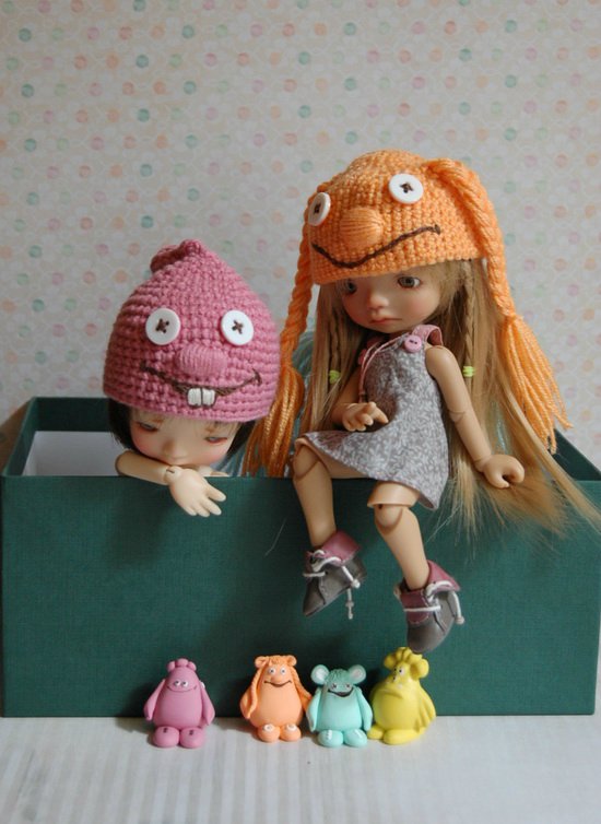 Малыши в смешных шапочках (фото 6)