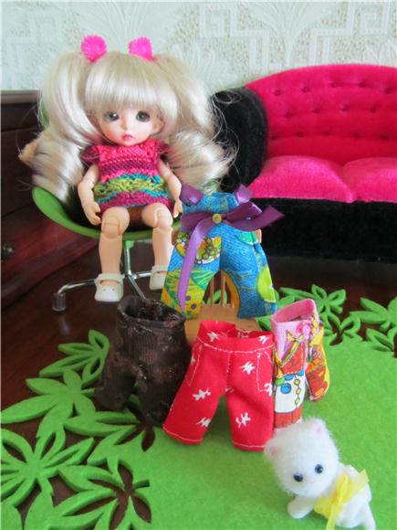 Сказка о новом комбинезончике или как Мэгги примеряла косы